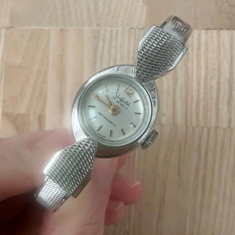 Vintage Sheffield ladies silver tone hinged cuff bracelet mechanical watch